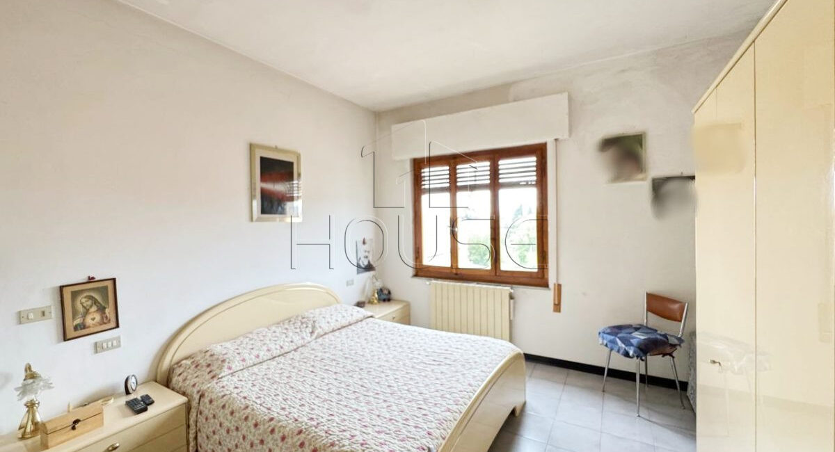 Appartamento con terrazza, garage e giardino comune