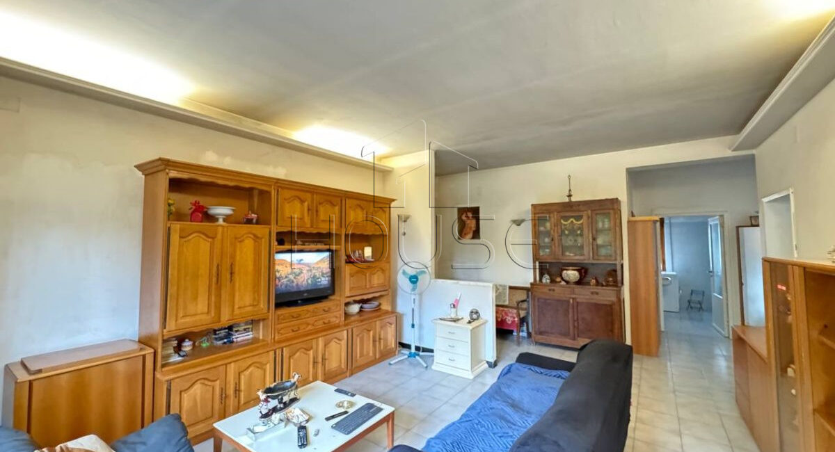 Appartamento con terrazza, garage e giardino comune
