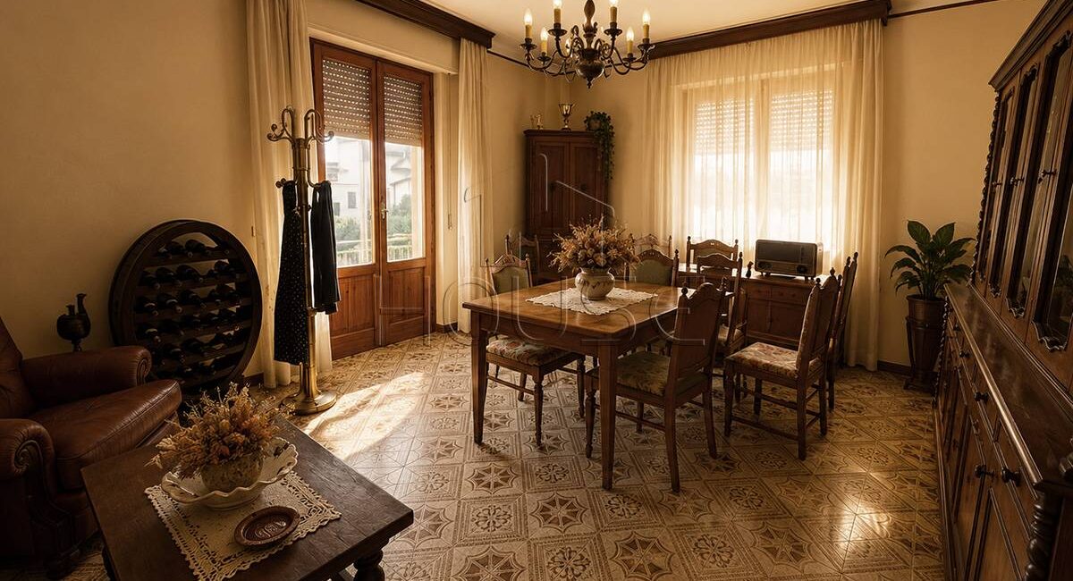Casa singola con due unità e giardino