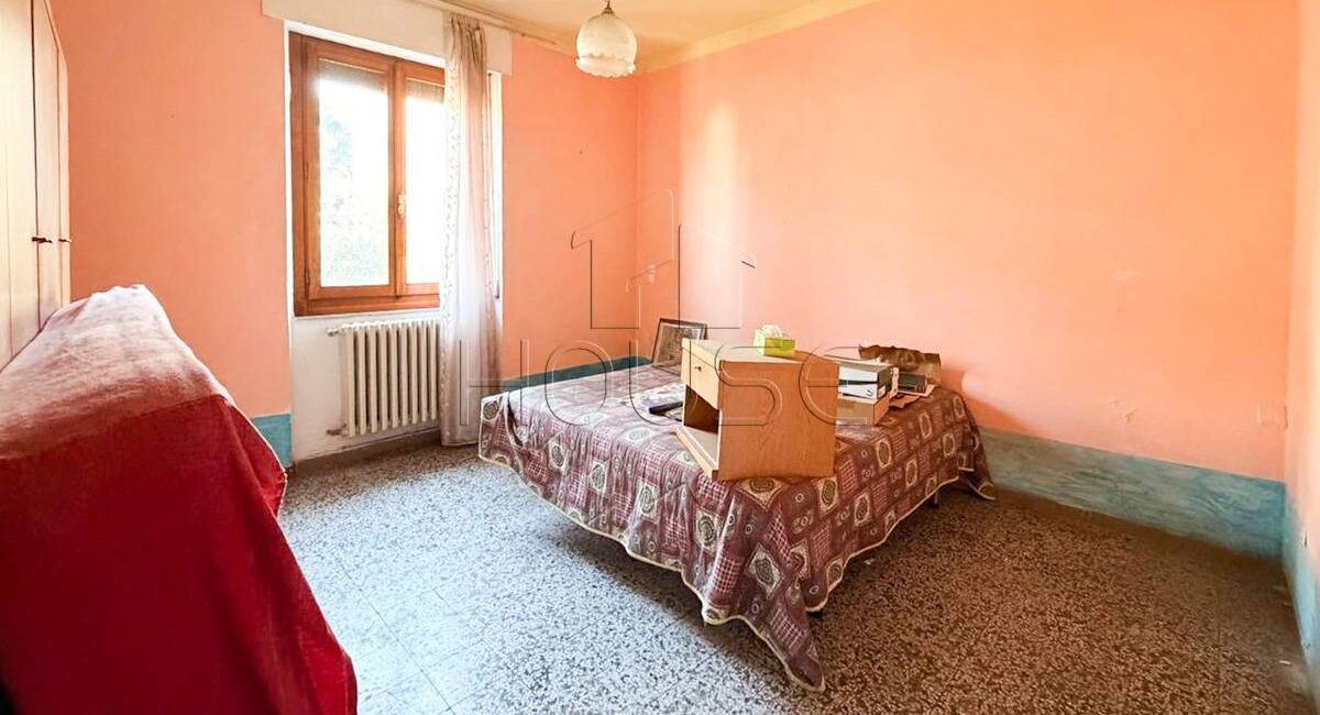 Terra tetto con due appartamenti e giardino