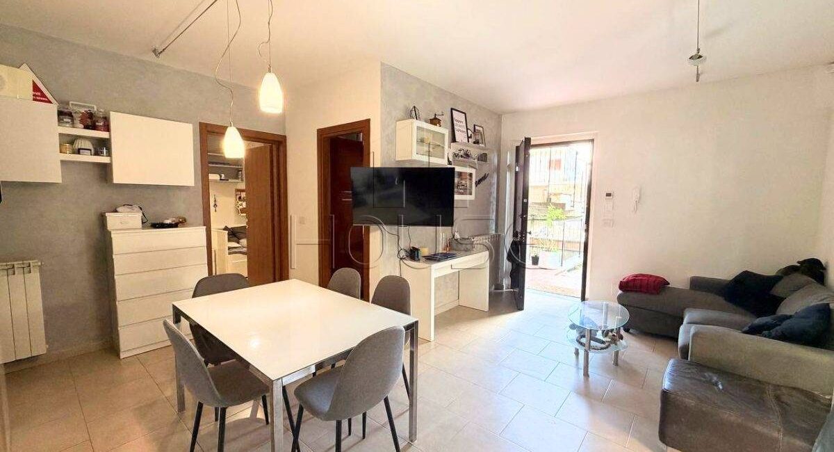 Appartamento con giardino e garage