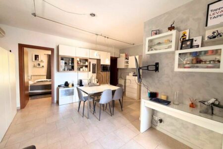 Appartamento con giardino e garage